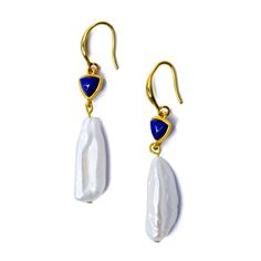 This earrings are crafted from Pearls and Lapis Lazuli. Feel uniquely special, knowing your jewelry is designed and crafted with care, imbued with a story and history that celebrates your individuality. Weave a narrative of elegance and timeless beauty, making you feel connected to something truly exquisite. 2.15" Total Length Lapis Lazuli Beads 4mm x 13mm, Semi-precious stone, From Afghanistan Freshwater Pearls 25mm x 9mm, From HangZhou China 14K Gold Plated Sterling Silver Hoop, 18mm, From Korea Handmade in Westport CT. US Free shipping and Free returns within 90 days of receipt 2-year warranty Luxury Drop Earrings With Natural Stones, Luxury Natural Stone Drop Earrings, Artisan Teardrop Jewelry For Formal Occasions, Luxury Single Pearl Earring As Gift, Luxury Single Pearl Earring For Gift, Elegant Sterling Silver Earrings With Natural Stones, Artisan Dangle Jewelry For Formal Occasions, Luxury Long Drop Earrings As Gift, Fine Jewelry Pearl Gemstone Earrings As Gift