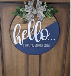 a sign that says hello i hope you brought coffee on the door to someone's house