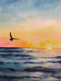 a watercolor painting of a bird flying over the ocean at sunset, with an orange and blue sky