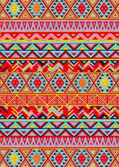 a colorful pattern with many different colors and patterns on the fabric, including red, blue,