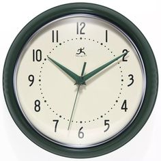 a green and white clock with numbers on it