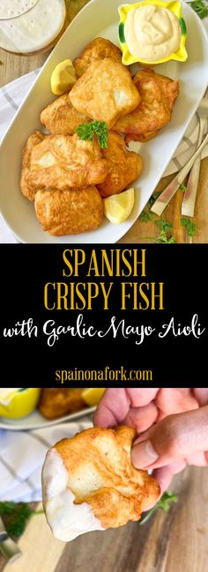 spanish crispy fish with garlic mayo aiolie on a white platter and in the foreground is a hand holding a piece of bread