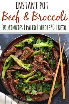 beef and broccoli stir fry in a pan with chopsticks next to it