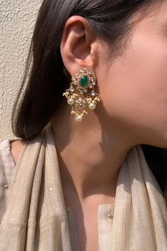 925 sterling silver, gold plated chandeliers with white, green polki, semi precious stone embellishment and pearl drops. - Aza Fashions Elegant Kundan Jhumkas With Pearl Drop, Elegant Jeweled Chandelier Earrings For Festive Occasions, Elegant Green Bridal Earrings For Reception, Elegant Green Danglers For Festive Occasions, Elegant Kundan Chandelier Earrings With Pearl Drop, Gold Chandbali Danglers For Designer Wear, Elegant Gold Chandelier Earrings With Stone Work, Elegant Green Chandelier Earrings With Intricate Design, Elegant Gold Danglers With Stone Work