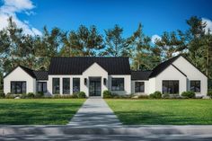 a white house with black shingles and trees in the background