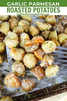 garlic parmesan roasted potatoes on a baking sheet