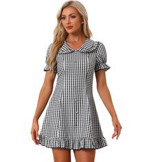 Look as cute as you do cool and collected in this Peter Pan collar dress. This fanciful Peter Pan collar mini dress is designed with a sweet collar and ruffled skirt. The beautiful gingham print dress has short puff sleeves and a mini-length skirt finished with a soft ruffle hem. Walk with a brisk in your step in the Gingham Print Wrap Mini Dress and be the center of everyone's attention. Summer Mini Dress With Ruffles And Doll Collar, Cute Fitted Mini Dress With Doll Collar, Puff Sleeve Mini Dress With Ruffles For Picnic, Cute Mini Dress With Ruffles And Doll Collar, Fitted Mini Plaid Dress With Ruffles, Fitted Mini Length Plaid Dress With Ruffles, Fitted Plaid Mini Dress With Ruffles, Retro Fitted Mini Length Plaid Dress, Retro Fitted Mini Plaid Dress