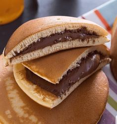 a stack of pancakes sitting on top of a table