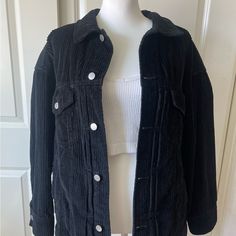 Urban Outfitters Bdg Jana Wide Wale Corduroy Trucker Jacket Condition: Nwt. Does Have A Small Stain In The Bottom And Top Of Jacket. (Shown In Pic) Size: Xs/S (Oversized Fit, Could Fit A L) Color: Black Top Not Included. Note: Some Items Have Been Stored Away For Some Time. It May Be Wrinkled & Have Lint, Hair, Or Dust. Trendy Urban Outfitters Outerwear For Work, Casual Urban Outfitters Outerwear For Work, Trendy Corduroy Outerwear For Work, Trendy Corduroy Workwear Outerwear, Black Corduroy Outerwear For Fall, Urban Outfitters Outerwear With Pockets For Work, Trendy Corduroy Outerwear With Button Closure, Corduroy Outerwear With Snap Buttons For Winter, Black Corduroy Outerwear For Work