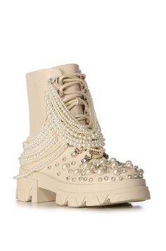 Our cream chunky lace up combat boots are embellished with luxurious faux pearls and delicate pearl beaded chains on the shaft. Step out in style with this unique and elegant addition to your wardrobe. Boots With Pearls, Chain Boots, Azalea Wang, Womens Combat Boots, Lace Up Combat Boots, Sandal Platform, Western Boots Women, Pearl And Lace, Combat Boot