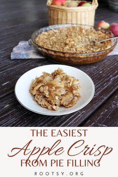 an apple crisp on a plate next to a pie