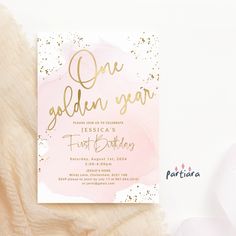 a pink and gold birthday card with the words one golden year on it