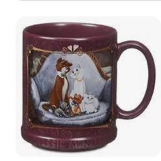 a coffee mug with an image of lady and the tramp on it's side