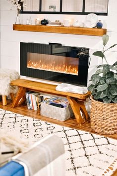 a living room with a fire place in the fireplace