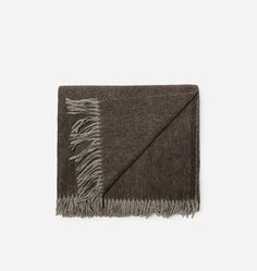 a brown and black scarf with fringes