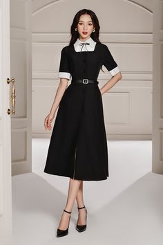 This stylish dress is crafted from a luxuriously soft blend of linen and cotton and features a shirt collar that brings elegance to any look. Complete your outfit with this timeless midi-dress. Black White Collar Dress, Elegant Black Collared Midi Dress, Black A-line Midi Dress With Feminine Style, Black Dress White Collar, Black Collared Vintage Dress, Contrast Collar Dress, Organza Shirt, Taffeta Skirt, Twisted Dress