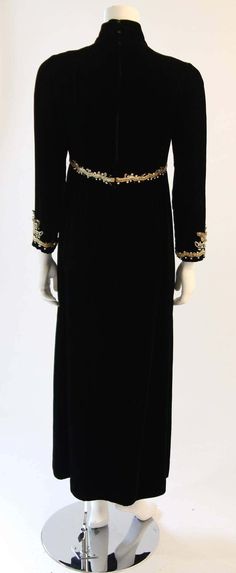 For Sale on 1stDibs - This is a gorgeous vintage custom made gown. The gown features a mock neck and long sleeves. The bodice is accented with gold braided details and rhinestones. Elegant Floor-length Ballroom Evening Dress, Vintage Long Sleeve Evening Dress For Formal Occasions, Vintage Long Sleeve Formal Gown, Embellished Gown, Black Velvet, Mock Neck, Bodice, Evening Dresses, 1960s