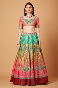 Green, yellow and pink attached cancan ombre lehenga with all over paisley calico bloom embroidery using tonal sequins, crystals, cut dana, beads highlights. Paired with a half sleeves padded blouse with bloom gardenia embroidery and flora mahal cut work border embellished maroon dupatta. - Aza Fashions Pink Meenakari Sets For Reception, Fitted Pink Lehenga With Meenakari Detailing, Pink Bohemian Set For Wedding, Pink Bohemian Wedding Sets, Pink Fitted Sharara With Meenakari Details, Pink Bohemian Lehenga For Reception, Bohemian Pink Lehenga For Reception, Fitted Bohemian Pink Choli, Pink Fitted Bohemian Choli