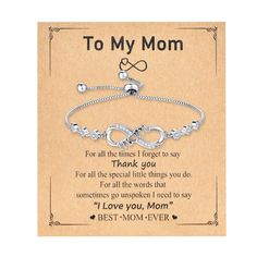 a mother's love bracelet with the words to my mom on it and an image of