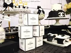 chanel cakes are stacked on top of each other