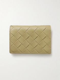 Bottega Veneta's distinctive intrecciato weaving technique has become a symbol of discreet luxury and Italian craftsmanship. This cardholder is made from strips of supple leather and has a classic, streamlined design that will easily slot into your pocket. Luxury Rectangular Wallets With Intrecciato Weave, Luxury Leather Wallet With Intrecciato Weave, Bottega Veneta Intrecciato, Streamline Design, Card Holder Leather, Weaving Techniques, Bottega Veneta, Latest Fashion, Card Holder