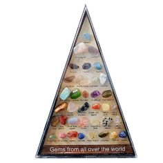 a pyramid shaped display with gems from all over the world