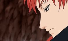 an anime character with red hair and black shirt looking at something in the distance behind him