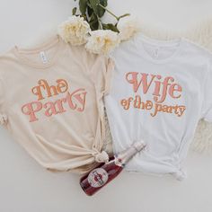 TRIXIE Retro Wife of the Party Bachelorette Group T-Shirt , is both elegant and comfortable. It is designed to flatter the figure while ensuring optimum freedom of movement. Add a touch of sophistication to your wardrobe with this timeless tee. 
click on the picture to go directly to the website Wife Of The Party Bachelorette, Wife Of The Party, Party Bachelorette, Shirt Women, Hat Crafts, Gaming Wall Art, Bachelorette Party, Craft Party, Casual Looks