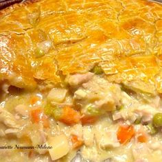 a casserole filled with meat and vegetables