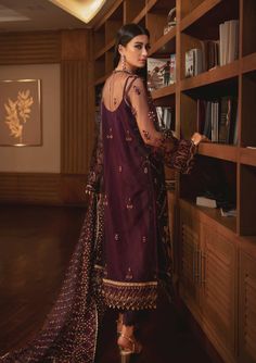 Purple Pakistani Dress with Elegant Embroidery is an elegant yet luxurious Pakistani Party Dress with breathtaking decorations on it rendering it unmatched in its grace and beauty. This Pakistani Formal Dress seems to be a perfect choice for any special day if you are looking for Pakistani Party Wear. Kameez: This Purple Pakistani Dress comes with a beautiful Long Kameez elegantly decorated with elegant threadwork, tilla, sequins, and some other embellishments. The fabric of this luxuriously mad Purple Pakistani Dress, Black Pakistani Dress, Indian Dresses Online, Pakistani Formal Dresses, Pakistani Party Wear, Salwar Dress, Dress Salwar Kameez, Chiffon Collection, Elegant Embroidery