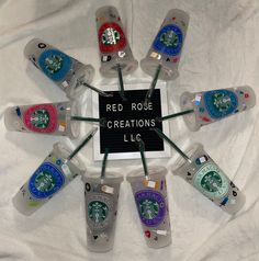 starbucks cups are arranged in a circle with the words red rose creations written on them