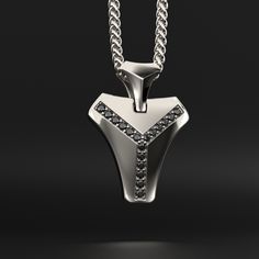 This magnificent pendant is composed of 18k white gold, includes 16 black diamonds and is completely handmade. A talisman stone is for those who want to know what life is all about. It will bring out all of your great qualities. The vertebrae that make up the human spine influenced its design. On a psychological level, this diamond represents what gives man the fortitude, bravery, drive, and unwavering belief to achieve his goals.Many people like white gold because of its silvery white hue, which gives it a refined appearance while also making it considerably more expensive than silver.White gold is impervious to rust, tarnish, and corrosion. White gold is more durable than yellow gold because it is alloyed with a combination of harder metals. Made entirely by hand with all the love and ar Luxury Black Diamond Pendant Necklace, Sterling Silver Black Diamond Pendant Necklace, Sterling Silver Pendant Necklace With Black Diamonds, Modern Sterling Silver Jewelry With Black Diamonds, Luxury White Gold Jewelry With Black Spinel, Luxury Black Spinel Silver Jewelry, Black Diamond Pendant, Human Spine, Hard Metal