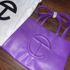 Telfar Shopping Bag Brand New Medium Size Grape Shopping Bag Comes With Dust Bag Sold Out Price Is Firm No Free Shipping #Palmangels #Telfar #Bag #Hat #Shirt Purple Telfar Bag Outfit, Trendy Purple Bag With Dust Bag Included, Purple Tote Shoulder Bag With Dust Bag, Designer Purple Tote Bag, Purple Telfar Bag, Telfar Bags Medium, Telfar Shopping Bag, Telfar Bags, Branded Shopping Bags