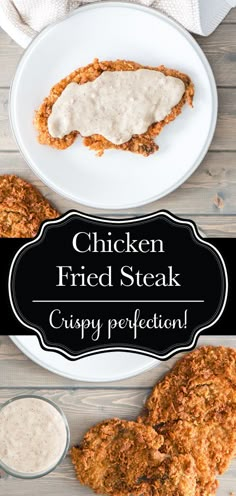 chicken fried steak with gravy is served on a white plate next to two small bowls of ranch dressing