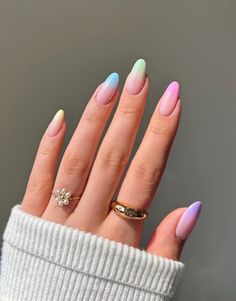 Discover stunning pastel nail designs that will elevate your manicure this spring and summer! From trendy colors to pretty nail art ideas, these almond-shaped ombre nails with French tips are just one example of the beautiful sets we've featured. Pastel Nail Art, Multicolored Nails, Pastel Nails Designs, Ombre Nail Designs, Easter Nails, Rainbow Nails, Pastel Nails, Holiday Nails