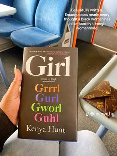 a person holding up a book in their hand with the title girl, girl, guy, gwool gull