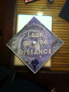 a graduation cap that says i can go the distance