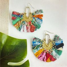 Brand New!! Beautiful Earrings Done In Colorful Layers Of Fringed Kantha Textiles That Form A Fabulous Boho, Statement Earring. Strips Of Fabric Fan Out From An Intricately Handcrafted Metallic Gold Plate. Each Piece Is Made From Recycled Kantha Textiles So The Colors & Patterns Are All One Of A Kind. Measures 2.5” Long With French Earring Wires Sustainably Handmade By Women Artisans. Gold Bohemian Tassel Earrings For Festive Occasions, Bohemian Multicolor Tassel Earrings For Festive Occasions, Bohemian Tassel Earrings With Latkans For Festivals, Bohemian Multicolor Chandelier Earrings For Celebrations, Multicolor Bohemian Chandelier Earrings For Celebrations, Bohemian Green Chandelier Earrings For Festive Occasions, Bohemian Multicolor Latkans Earrings, Bohemian Multicolor Festive Earrings, Bohemian Style Festive Dangle Tassel Earrings