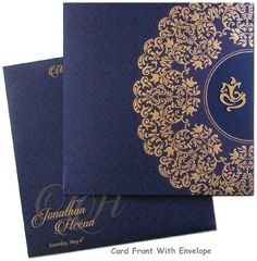 two blue and gold wedding cards, one with an ornate design on the front side