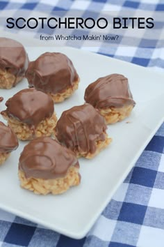 there are chocolate covered cookies on the plate