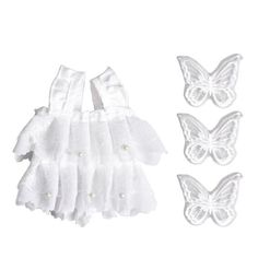 three pieces of white lace with butterfly appliques