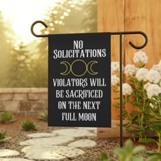 a sign that says no solicitations violators will be sacrigated on the next full moon