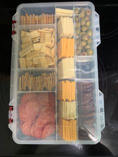 I used a new tackle box and washed it. Then added our favorite sliced cheeses, crackers and meat. I then lined one section with a paper towel and added olives. Vacation Snacks, Boat Food Ideas, Road Trip Food, Vacation Meals, Road Trip Snacks