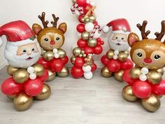 christmas balloons with santa claus and reindeers on them are arranged in the shape of trees