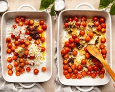 two pans filled with tomatoes and rice on top of a table next to each other