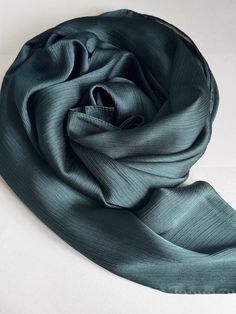 STUNNING LUXURY FORREST GREEN  SCARF Beautiful delicate soft lightweight textured scarf This scarf is a perfect accessory for both daytime and evening wedding wear worn as a shawl & wrap  Made from silk 30% Viscose 70% colour-Green  188cm length x 140cm width (approx)  Note: The scarf's colour may appear slightly different in person, as screen settings and lighting can affect how it looks on the phone or computer. Wear Shawl, Green Colour Palette, Green Scarf, Evening Wedding, Shawl Wrap, Wedding Wear, Shawls And Wraps, Bridal Wedding, Evening Wear