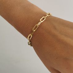 This Italian handcrafted chain link bracelet is completely composed of sterling silver and 18k gold plated silver and is uniquely made with a semi-hollow interior for comfortable everyday wear that will not dent An extender chain 16cm+2cm means it adjusts to fit different sizes. . Each individual necklace is unique and one of a kind and cleaned, buffed and polished. - we use only the finest quality materials - all components are 100% sterling silver or 18k Gold plated (Nickel free) - all pieces are designed in our happy studio Thick Oval Link 18K silver plated Gold Italian Chain Link Bracelet  D E T A I L S * Available in sterling silver or Crafted in Gold plated .925 sterling silver * Very easy to put on * An extender chain means it adjusts to fit different sizes 16-18cm.  All jewelry com Classic Link Chain Bracelet With Rolo Chain, Classic Chain Bracelet With Rolo Chain, Gold Oval Link Bracelet, Classic Rolo Chain Bracelet, Modern Link Bracelet With Rolo Chain, Modern Rolo Chain Link Bracelet, Modern Bracelets With Rolo Chain And Oval Link, Gold Oval Link Cable Chain Bracelet, Gold Oval Cable Chain Bracelet