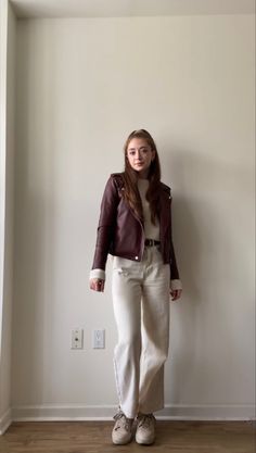 Burgundy/red & cream neutrals outfit inspo for fall. I’m wearing a burgundy/maroon/red leather jacket, cream colored cashmere sweater, cream colored jeans, a brown belt, and cream colored sneakers. Casual chic. Burgundy Moto Jacket Outfit, Maroon And Cream Outfit, Burgundy Belt Outfit, Brown Biker Jacket Outfit, Maroon Jacket Outfit, Mum Fits