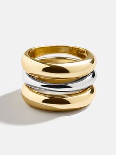 Unleash your bold side with the Moxie Ring. An extra long statement piece, this ring is gorgeously gold with a sliver of silver to create some mixed metal magic. Perfect for stacking or shining solo, the Moxie Ring adds a dash of daring to any look.