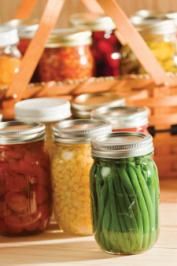 jars filled with green beans and other vegetables